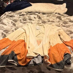Coverup Cream, Orange, and Black. 2XL